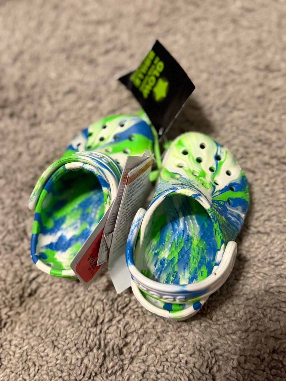 Crocs Kids Marbled Green & Blue Slip-On Clogs glow in the dark